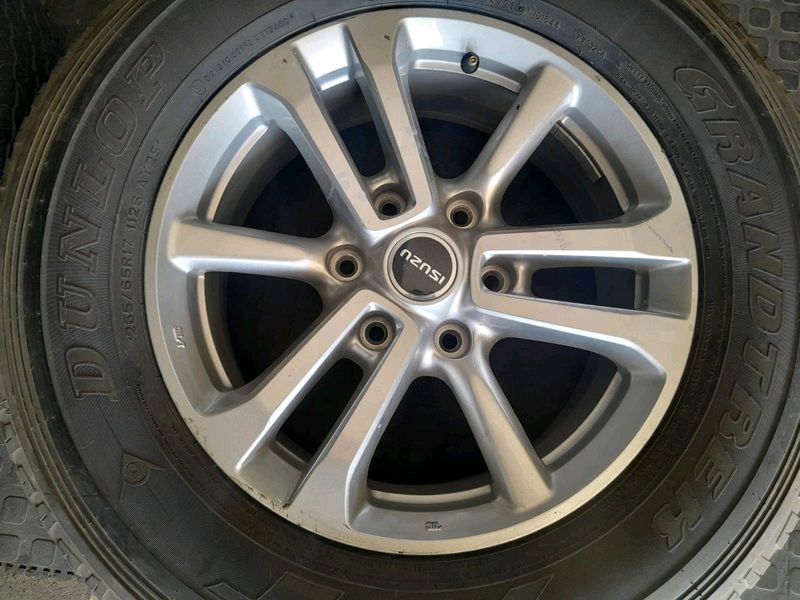 A clean set of 17inch Isuzu rims and tyres available for sale