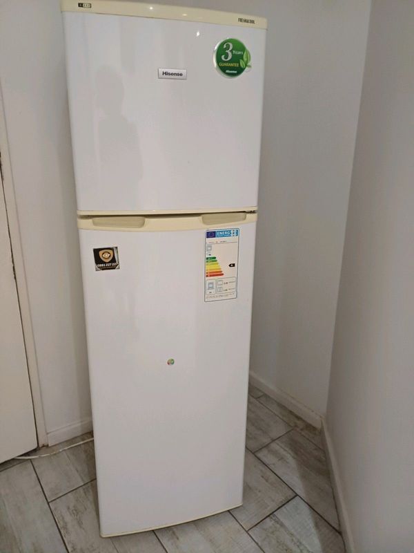 A standard white Hisense fridge is for sale in Sandton,0848 120008.