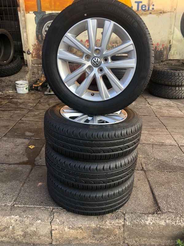 15 inch polo mags &amp; tires of 95% thread left. leave your whatsapp number if interested.