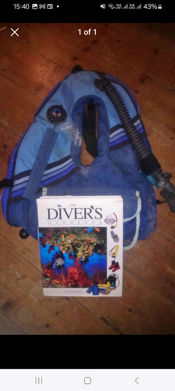 Buoyancy Aid Jacket and Diving Book with Tide Chart all in good condition
