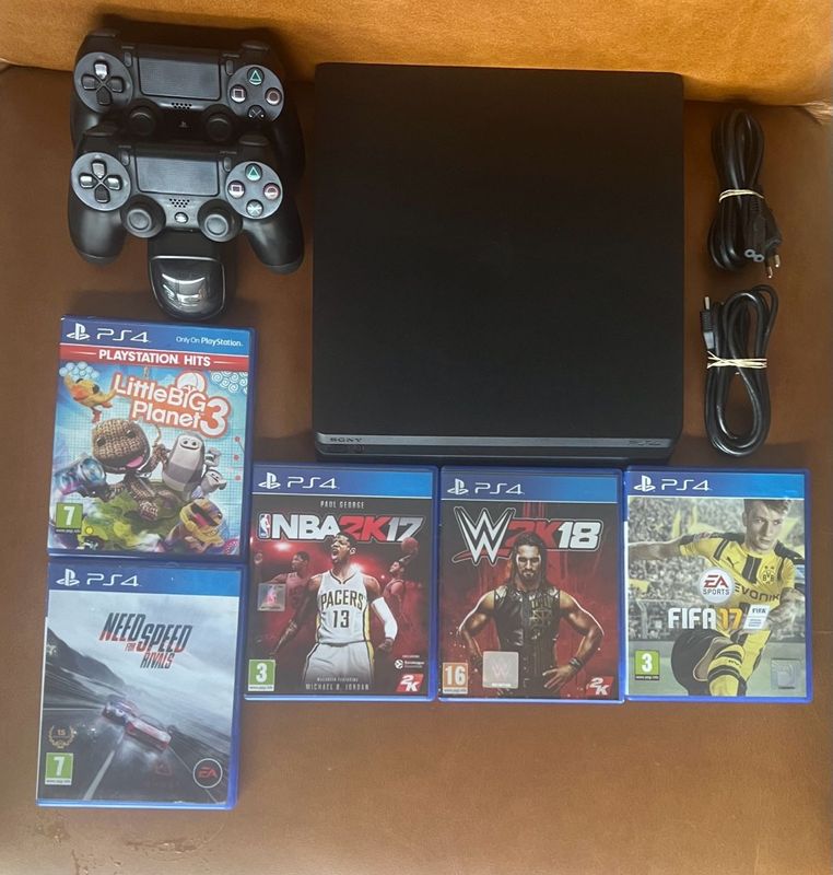 PS4 Slim 1TB with 2 Controllers and 5 Games