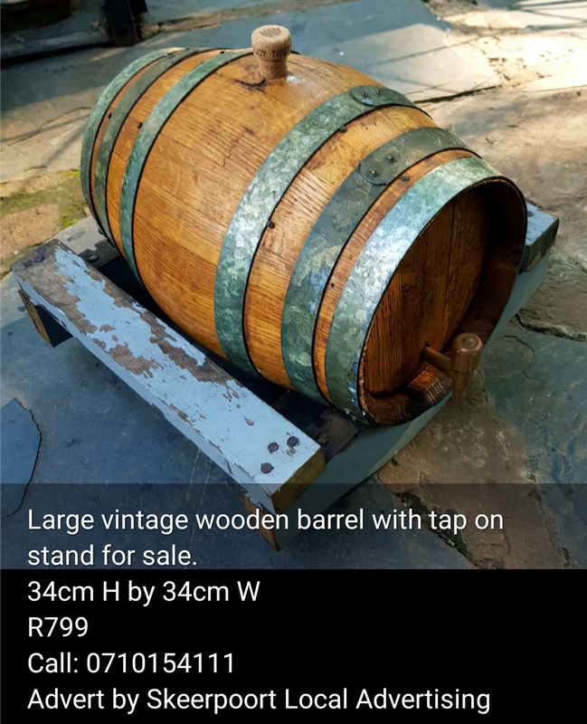 Large Vintage wooden barrel with tap on stand for sale