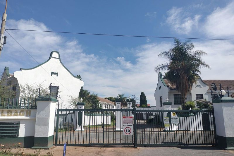 Charming Two-Bedroom Townhouse in Captivating Cape Dutch-Style Complex