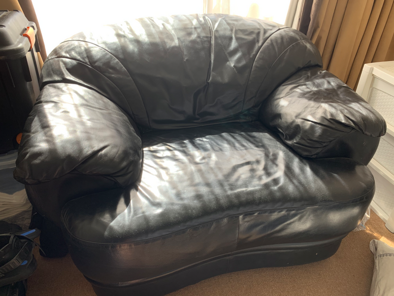 Genuine black leather single seater couch