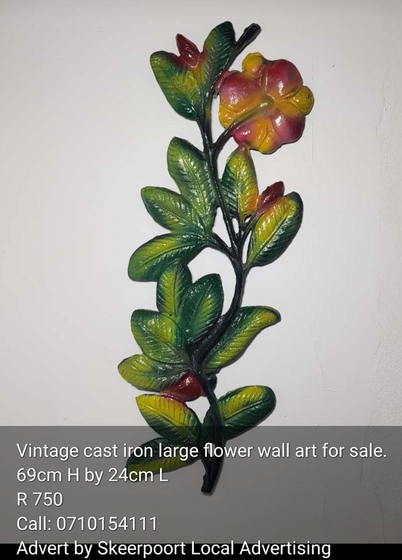 Vintage cast iron flower wall art for sale