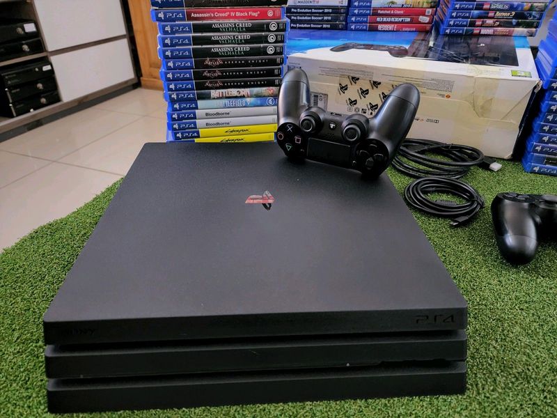 Sony ps4 pro 1tb includes all cables and x1 original wireless controler r5500