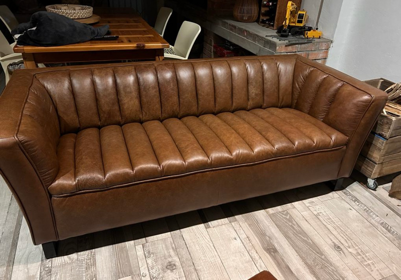 Newly manufactured 2.6m genuine leather MODERN three seater couch (A GRAND STATEMENT PIECE ALLROUND)
