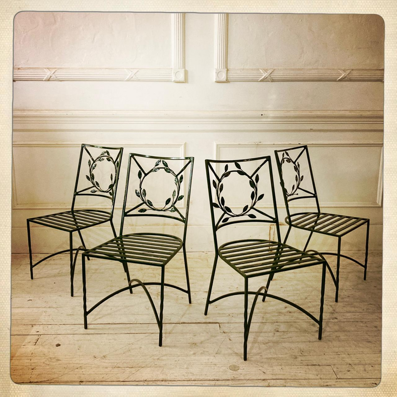 Wrought iron green painted patio chairs - R2800 per pair