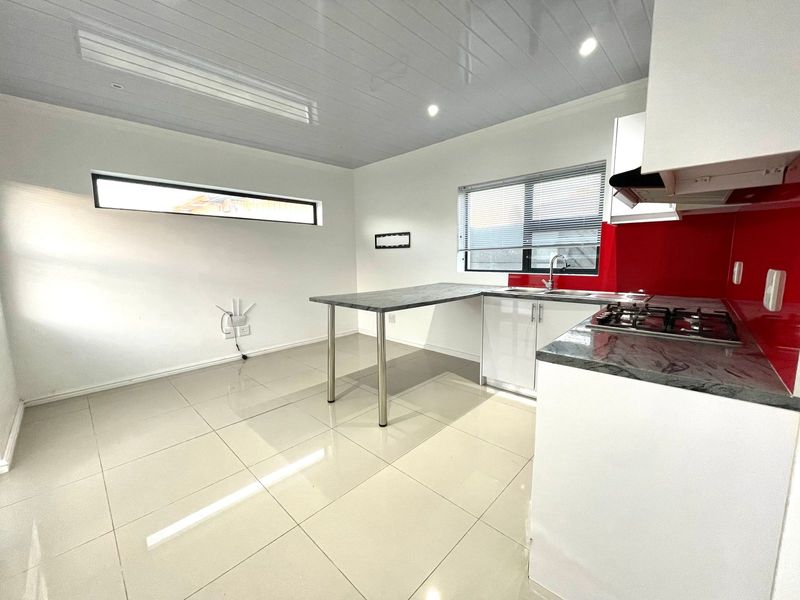 Embrace sophisticated comfort in this newly renovated 2-bedroom flatlet