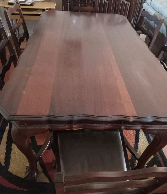 Antique dark wood 6 seater dinning room table with chairs and side unit