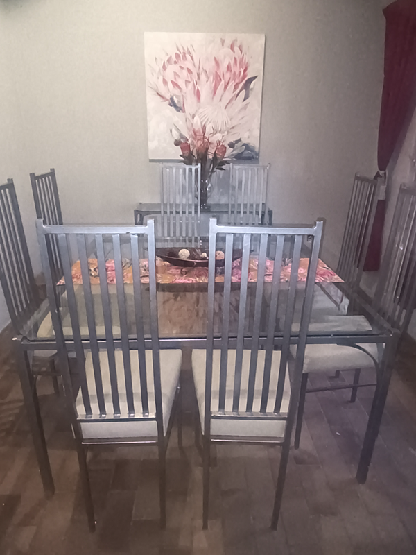 8 seater glass dining table with side stand for sale