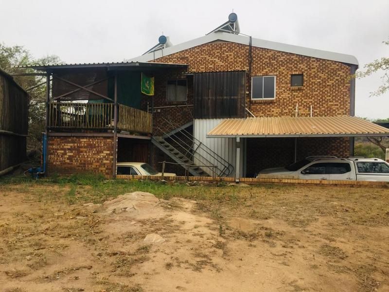 1 Ha plot fully tenanted, consist of 3 x Flat units, a workshop, office, a boma/lapa and addition...