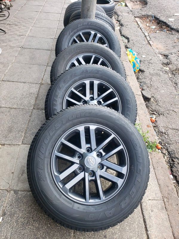 A Set of 17 inche Rims And TYRES