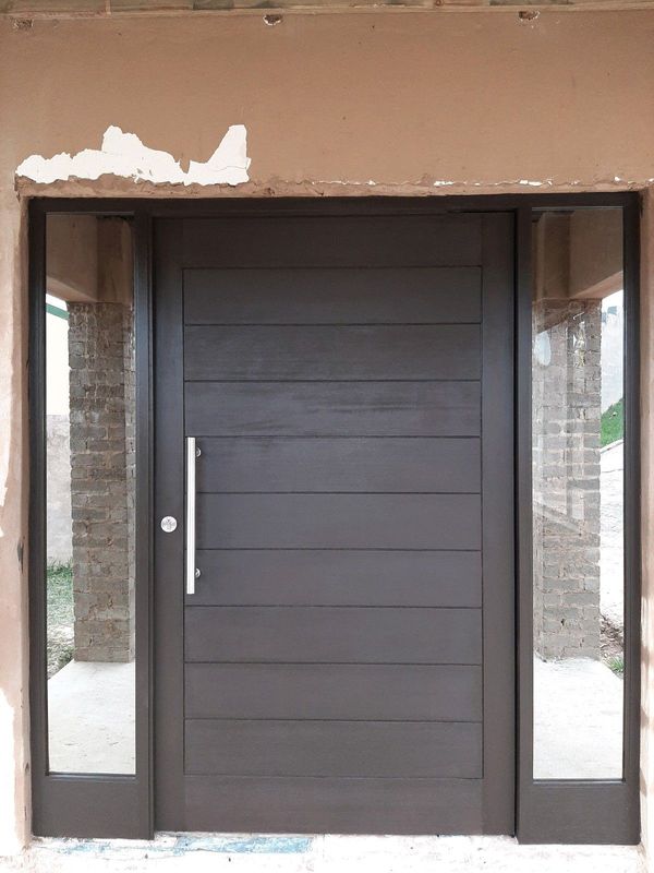 Carpenter Bluff, wooden door hanging and repairs Amanzimtoti, pivot doors, wooden windows, skirting