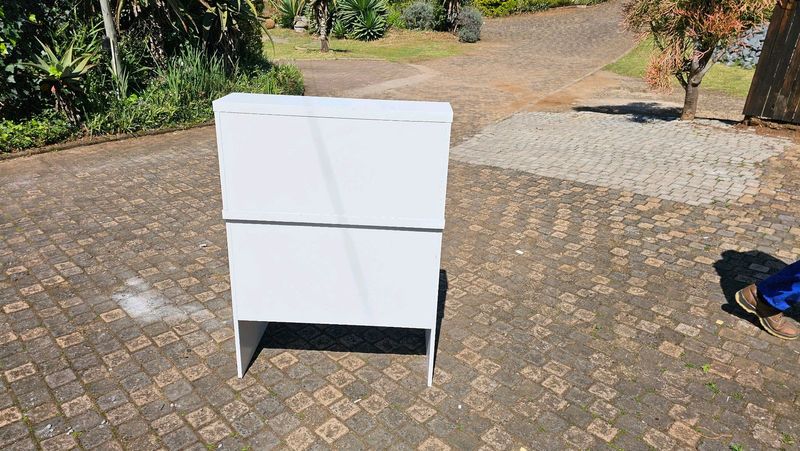 White reception counter for small areas