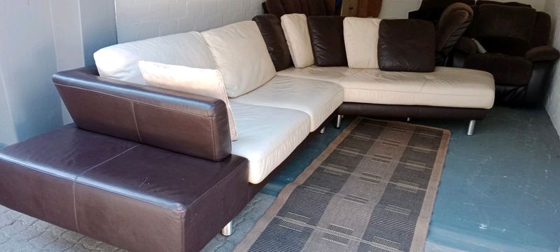 Genuine leather corner couch in as new condition.