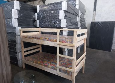 Wood bunk bed with mattresses