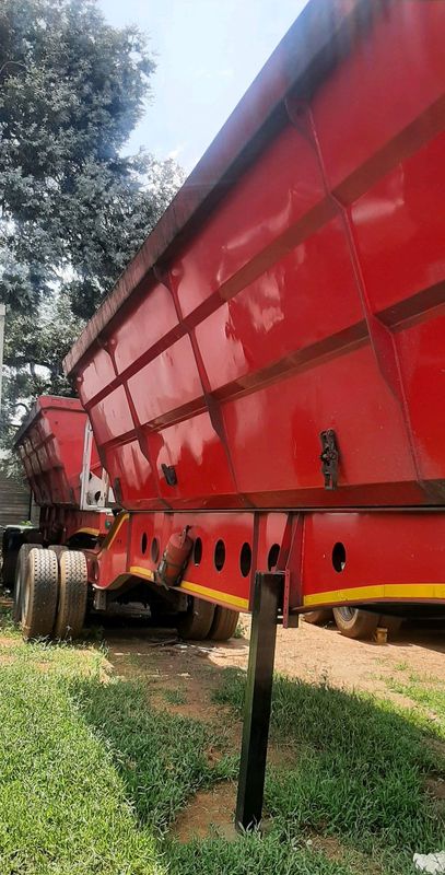 PULL THIS QUALITY SIDE TIPPER TRAILER.
