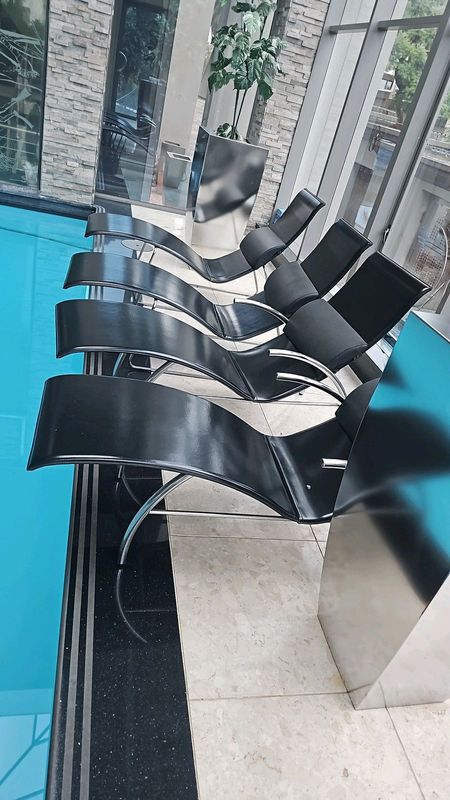 4 x Leather pool loungers for sale