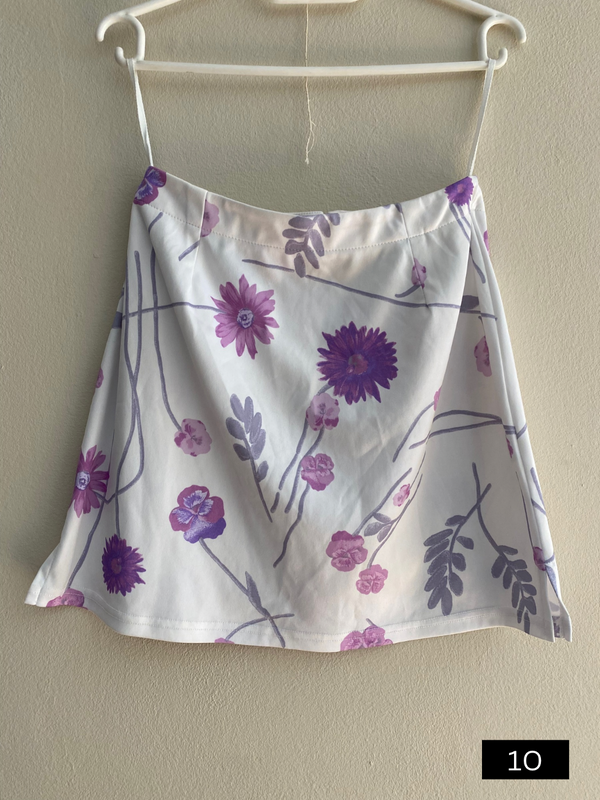 Beautiful White mini skirt with purple flowers, size 8, R50