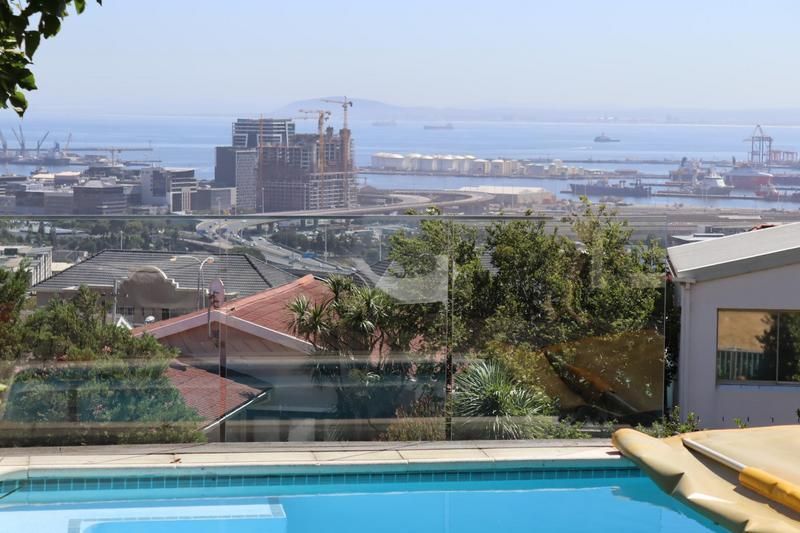 Upmarket 3 bedroom townhouse in High Cape with a pool and spectacular views of the harbour and city