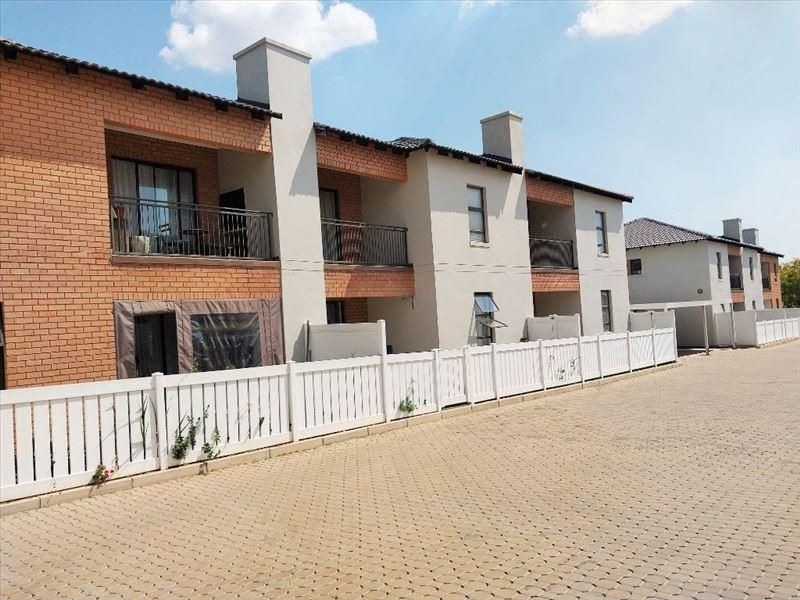Introducing a stunning 1st-floor townhouse in a sought-after sectional title complex.