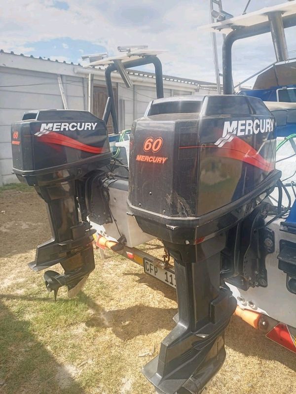 Pair of 60hp Mercury Outboards. Trim &amp; Tilt. Autolube. Mechanically perfect.