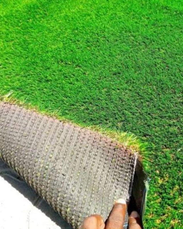 Artificial synthetic grass and natural roll on lawn grass