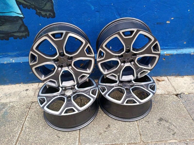 A set of 18inches OEM Jeep Renegade mags rim 5x110 PCD also fit Opel Adam or any 5x110