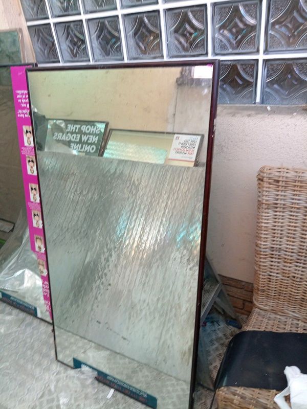 Mirror with brown frame