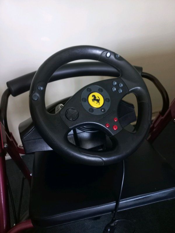 Ferrari Thrustmaster Wheel and pedals set.