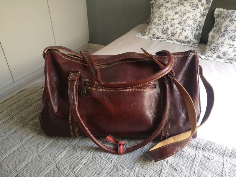 Real ox blood leather duffel travel bag weekender bought 2 in sri lanka and never used this one