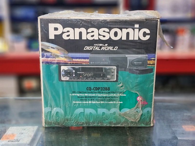 Brand new PANASONIC CAR RADIO CASSETTE/8 DISC CD SHUTTLE COMBO