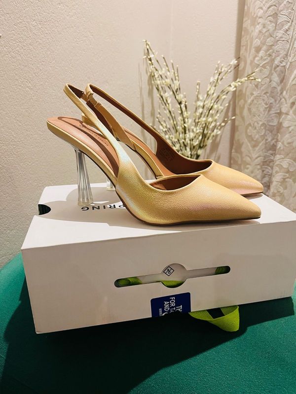 Brand New Nude High Heels. Size 6