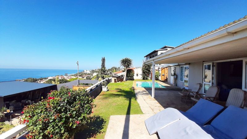 Unparalleled Investment Opportunity with Dual Homes and Sweeping Sea Views