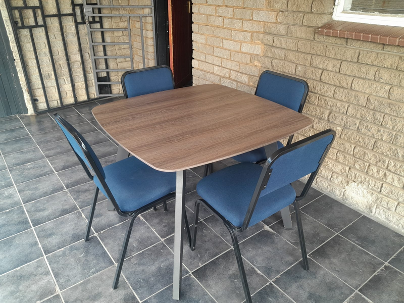 4 Seater meeting table with 4 Rickstacker chairs