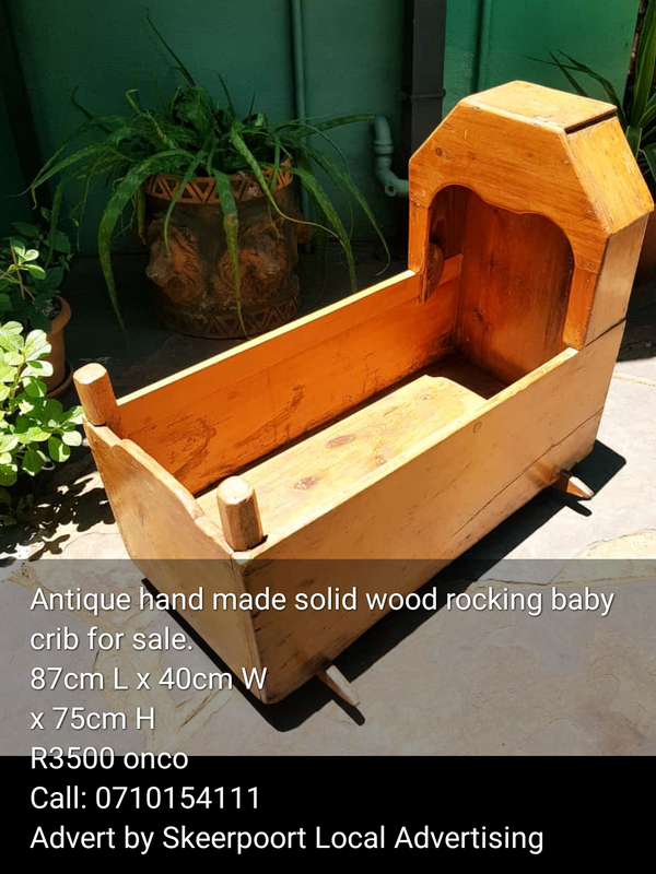 Antique hand made solid wood rocking baby crib for sale