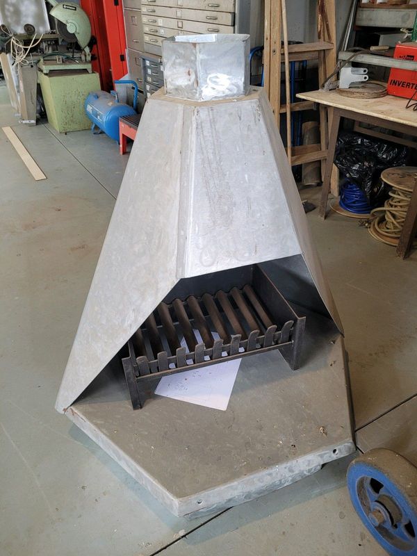 Galvanised steel fireplace with chimney