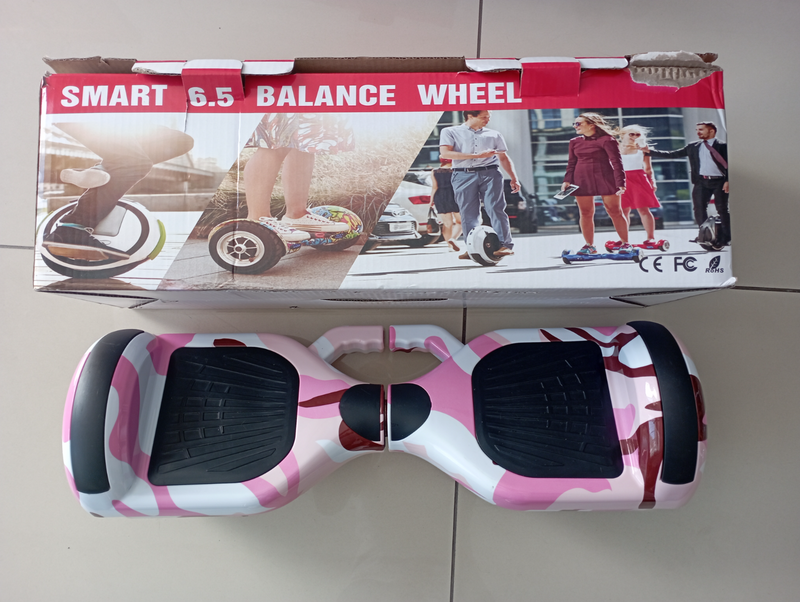 Pink 6.5 Inch Smart Auto Balance Hoverboard with Bluetooth Speaker (almost brand new)