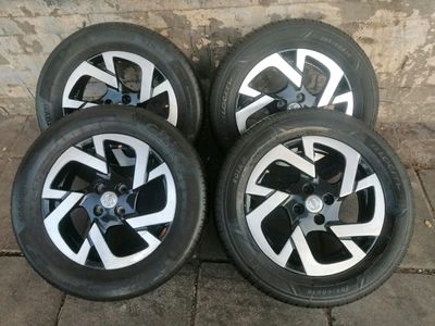A set of 16" mqgs and tyres for nissan magnite
