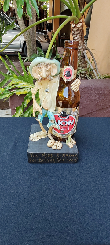 Vintage Bar ornament  lion bottle with clay figure