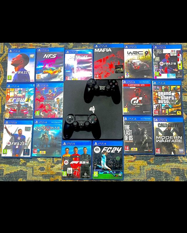 PlayStation 4 plus 14 video games