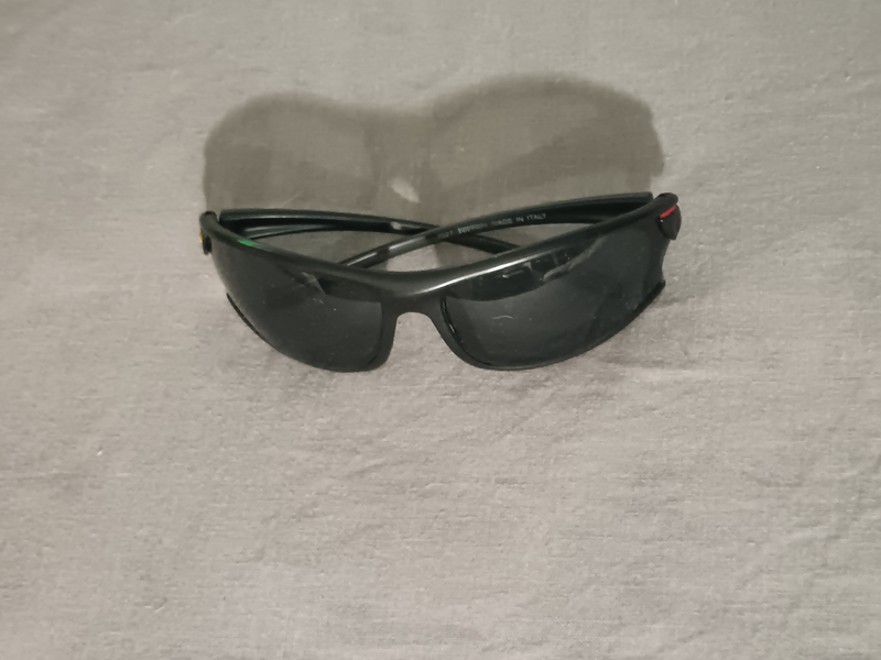 Used Ferrari black men&#39;s racing sunglasses.