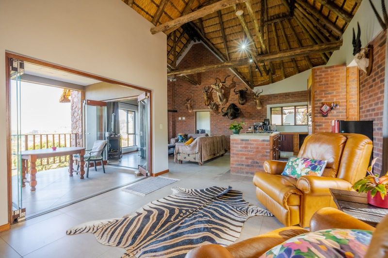 CLASSY GAME LODGE STYLE HOME IN GATED ESTATE