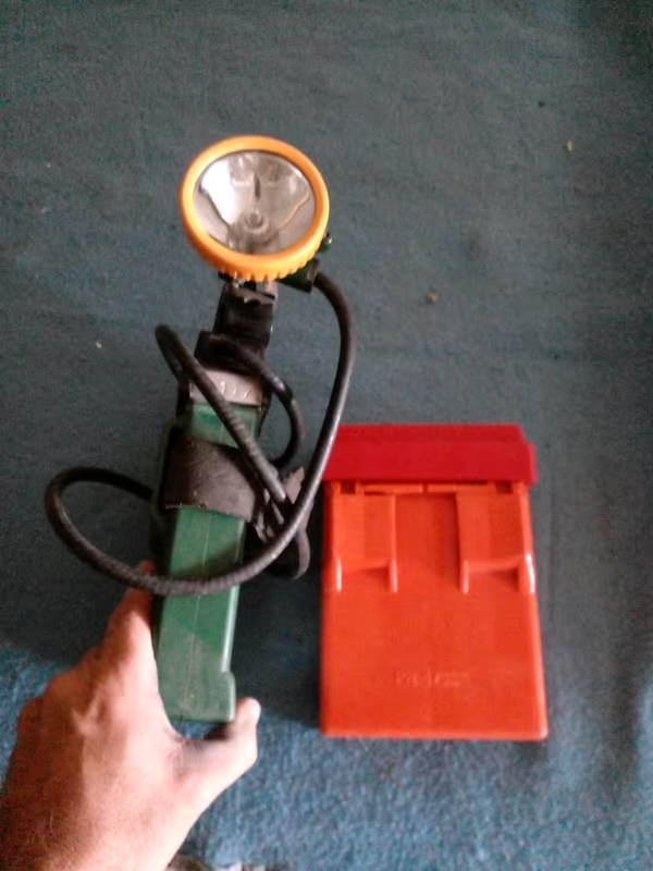 Collectors Miner head lamp and battery pack plus spare battery. 80s era.