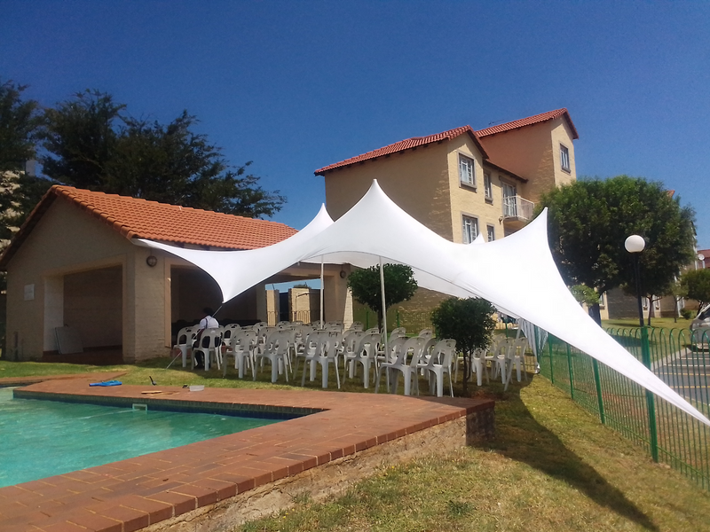 White Stretch tent and plastic chairs hire