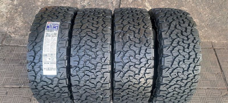 A set of brand new 265 60 r18 b fgoodrich all terrian tires for sale.