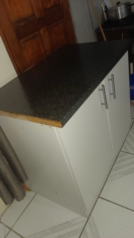 Cupboard and washing machine