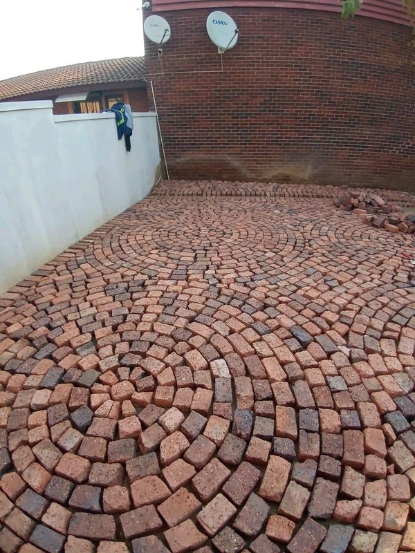 Cobble half brick paving and tar surfacing