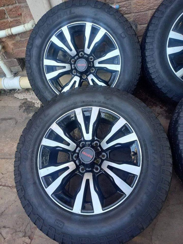 Isuzu bakkie mags size 18 with tyres set originals